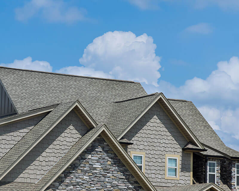 Horizontal image of house serviced by residential roof repair in Kansas City