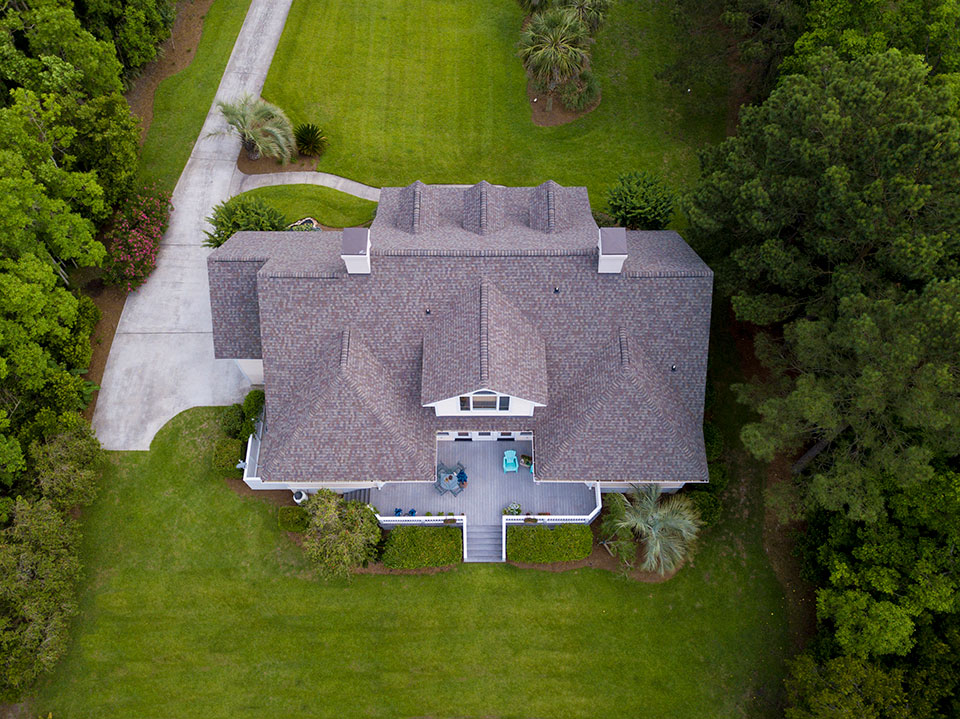 Aerial view of Kansas City home serviced by roofing company