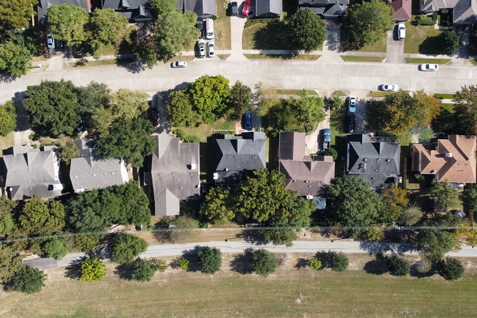 A top-down, aerial view of a residential neighborhood.